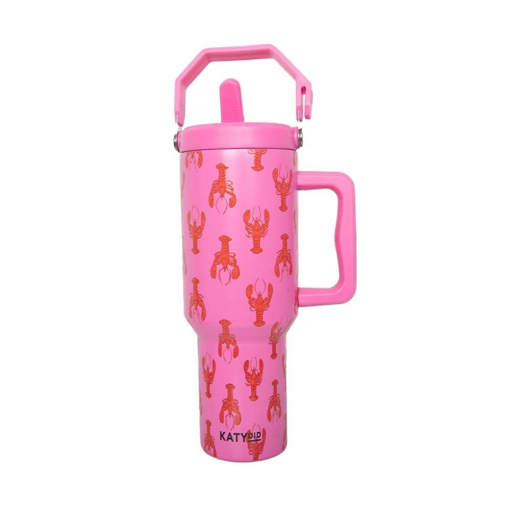 Pink tumbler with lobster design and handle on a white background