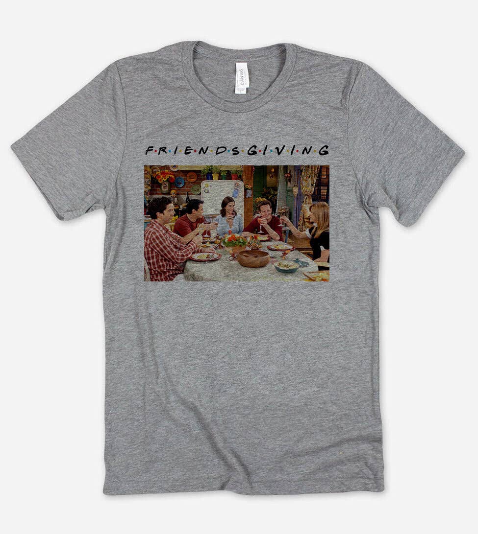 Gray t-shirt with 'Friendsgiving' graphic featuring a group of people around a table.