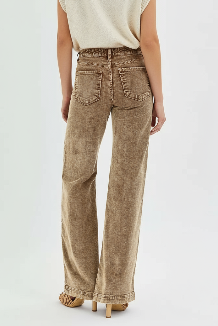 Brown wide-leg jeans on a white background