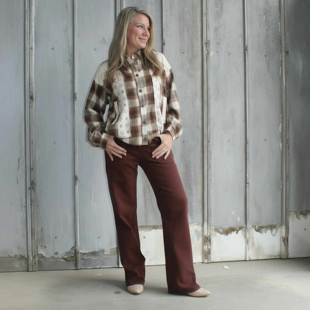 Person standing on a staircase in an urban setting