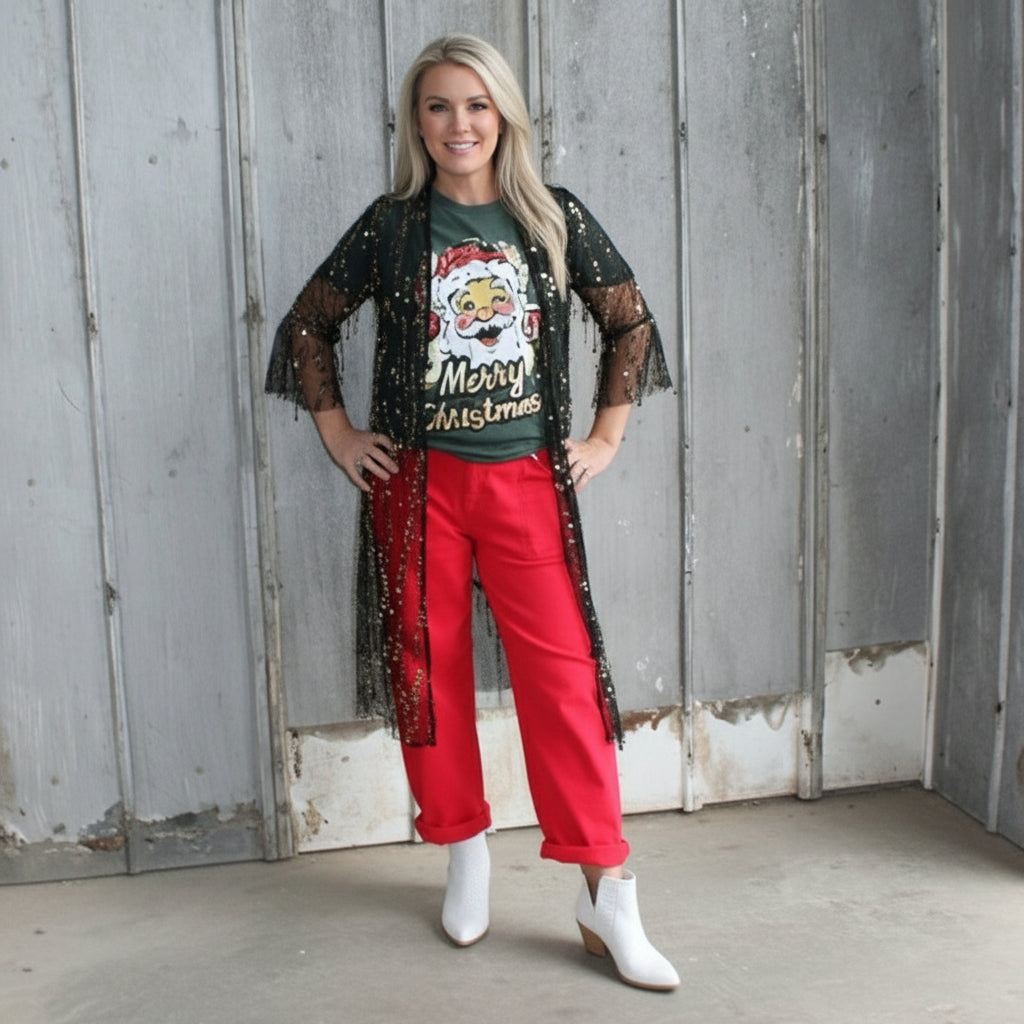 Person standing on a set of stairs with a textured wall in the background